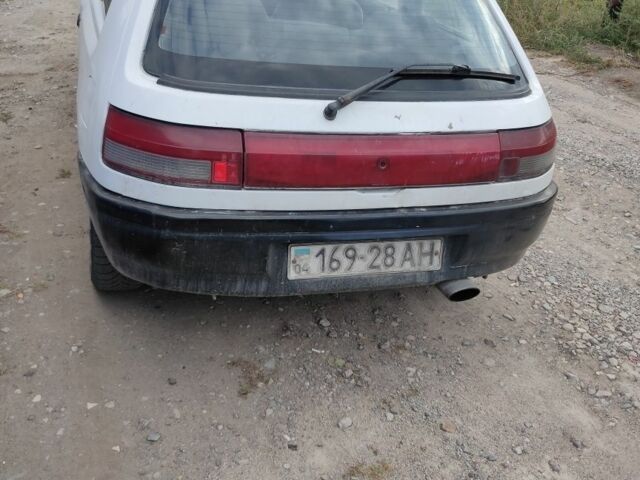 Белый Мазда 323, объемом двигателя 0 л и пробегом 480 тыс. км за 500 $, фото 3 на Automoto.ua