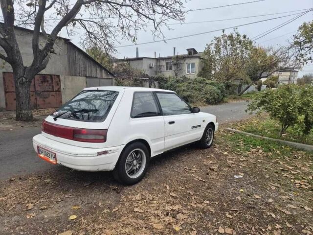 Белый Мазда 323, объемом двигателя 1.6 л и пробегом 298 тыс. км за 1300 $, фото 3 на Automoto.ua