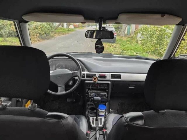 Белый Мазда 323, объемом двигателя 1.6 л и пробегом 298 тыс. км за 1300 $, фото 4 на Automoto.ua