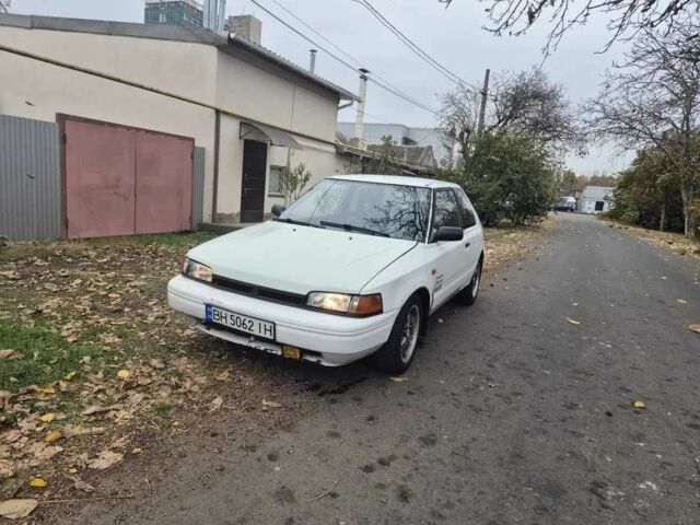 Белый Мазда 323, объемом двигателя 1.6 л и пробегом 298 тыс. км за 1300 $, фото 2 на Automoto.ua