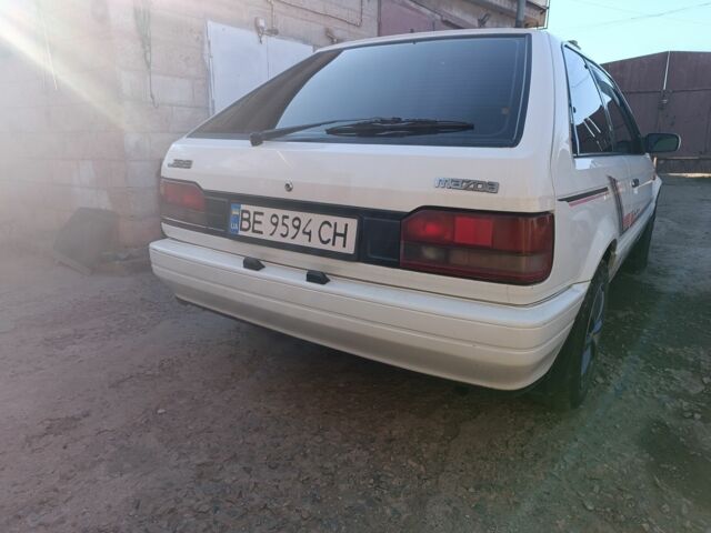 Белый Мазда 323, объемом двигателя 1.6 л и пробегом 200 тыс. км за 1350 $, фото 3 на Automoto.ua