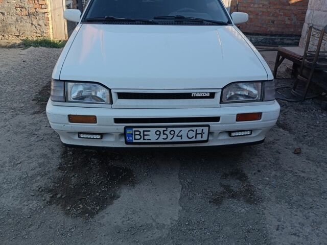 Белый Мазда 323, объемом двигателя 1.6 л и пробегом 200 тыс. км за 1350 $, фото 2 на Automoto.ua