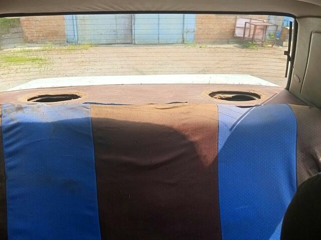 Белый Мазда 323, объемом двигателя 1.7 л и пробегом 300 тыс. км за 720 $, фото 7 на Automoto.ua