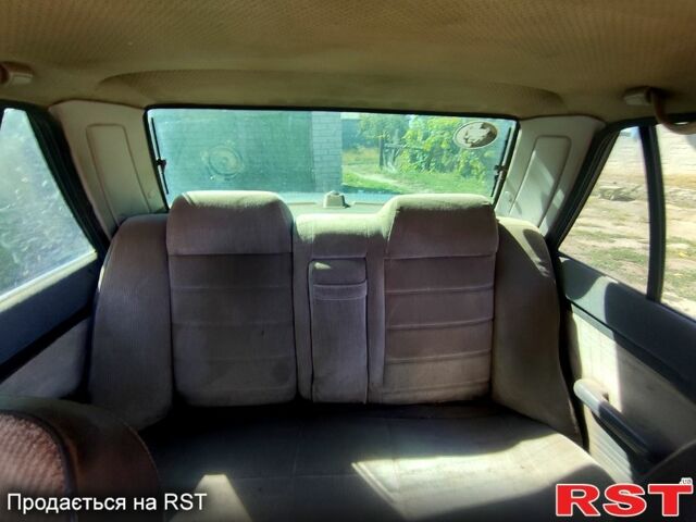 Білий Мазда 323, об'ємом двигуна 1.3 л та пробігом 380 тис. км за 720 $, фото 1 на Automoto.ua