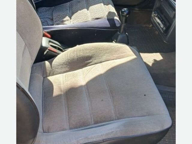 Белый Мазда 323, объемом двигателя 1 л и пробегом 324 тыс. км за 831 $, фото 5 на Automoto.ua