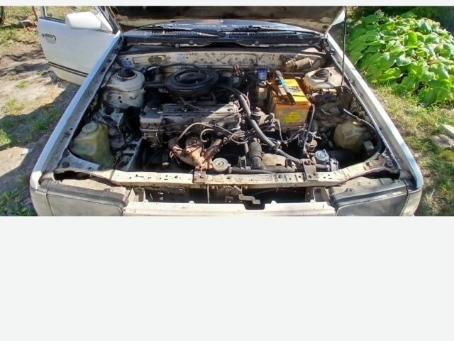 Белый Мазда 323, объемом двигателя 1 л и пробегом 324 тыс. км за 831 $, фото 4 на Automoto.ua