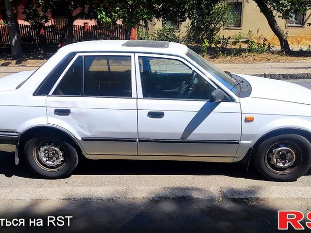 Белый Мазда 323, объемом двигателя 1.3 л и пробегом 888 тыс. км за 800 $, фото 5 на Automoto.ua