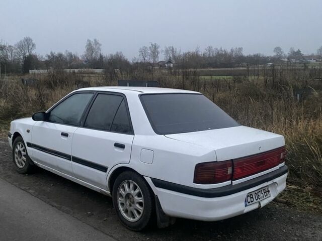 Белый Мазда 323, объемом двигателя 1.6 л и пробегом 999 тыс. км за 1000 $, фото 2 на Automoto.ua