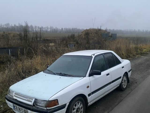 Белый Мазда 323, объемом двигателя 1.6 л и пробегом 999 тыс. км за 1000 $, фото 1 на Automoto.ua