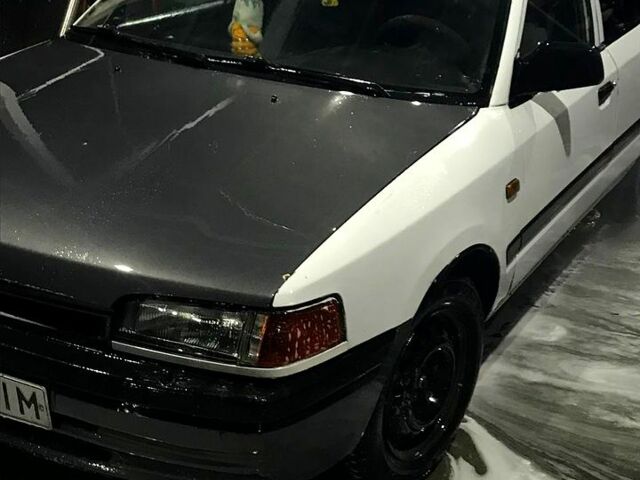 Білий Мазда 323, об'ємом двигуна 1.6 л та пробігом 0 тис. км за 550 $, фото 2 на Automoto.ua