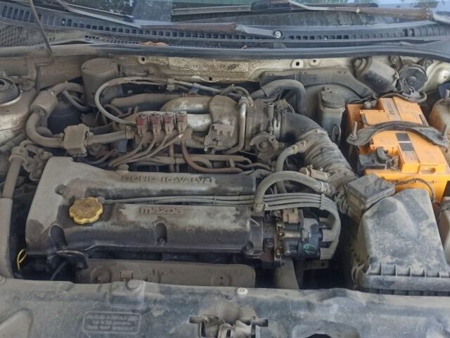 Белый Мазда 323, объемом двигателя 0 л и пробегом 485 тыс. км за 2200 $, фото 7 на Automoto.ua