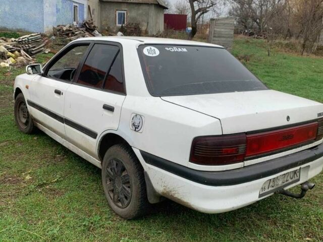 Белый Мазда 323, объемом двигателя 1.7 л и пробегом 300 тыс. км за 850 $, фото 4 на Automoto.ua