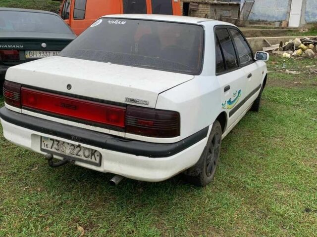 Белый Мазда 323, объемом двигателя 1.7 л и пробегом 300 тыс. км за 850 $, фото 3 на Automoto.ua