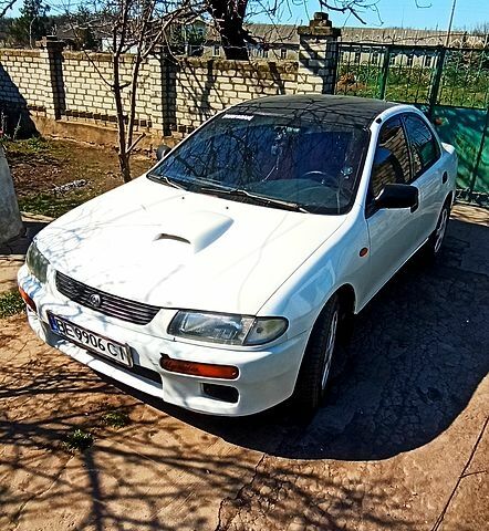 Белый Мазда 323, объемом двигателя 15 л и пробегом 480 тыс. км за 2200 $, фото 3 на Automoto.ua
