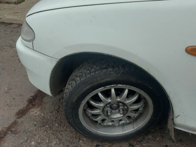 Белый Мазда 323, объемом двигателя 1.5 л и пробегом 330 тыс. км за 1850 $, фото 5 на Automoto.ua