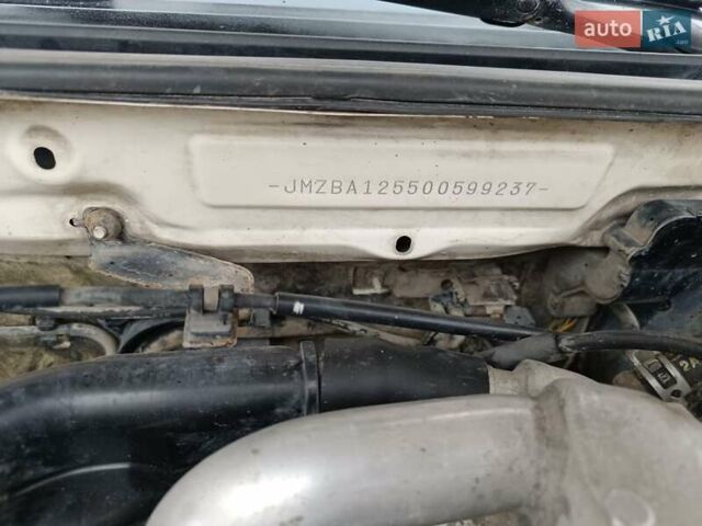 Белый Мазда 323, объемом двигателя 1.5 л и пробегом 420 тыс. км за 2750 $, фото 34 на Automoto.ua