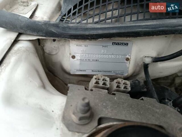 Белый Мазда 323, объемом двигателя 1.5 л и пробегом 420 тыс. км за 2750 $, фото 33 на Automoto.ua