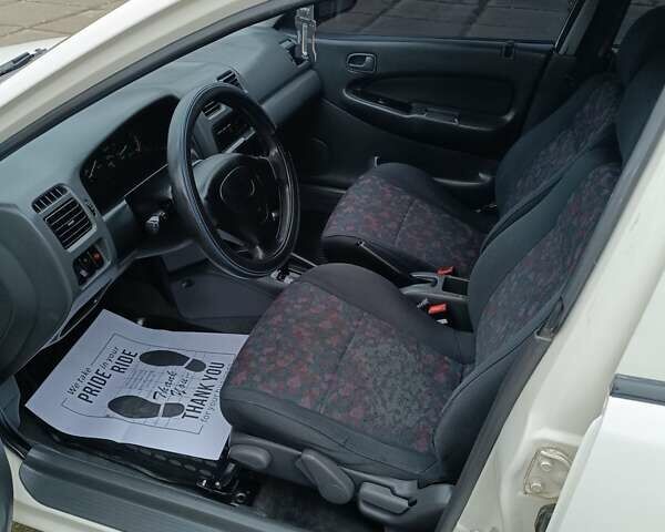 Белый Мазда 323, объемом двигателя 1.5 л и пробегом 420 тыс. км за 2750 $, фото 15 на Automoto.ua