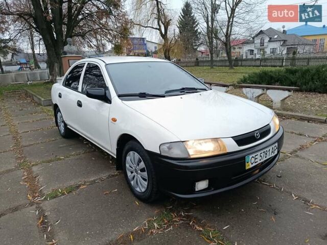 Белый Мазда 323, объемом двигателя 1.5 л и пробегом 420 тыс. км за 2750 $, фото 3 на Automoto.ua