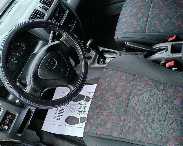 Белый Мазда 323, объемом двигателя 1.5 л и пробегом 420 тыс. км за 2750 $, фото 17 на Automoto.ua