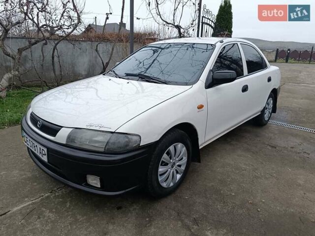 Белый Мазда 323, объемом двигателя 1.5 л и пробегом 420 тыс. км за 2750 $, фото 27 на Automoto.ua