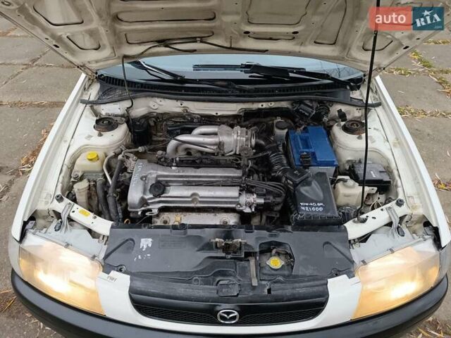 Белый Мазда 323, объемом двигателя 1.5 л и пробегом 420 тыс. км за 2750 $, фото 29 на Automoto.ua