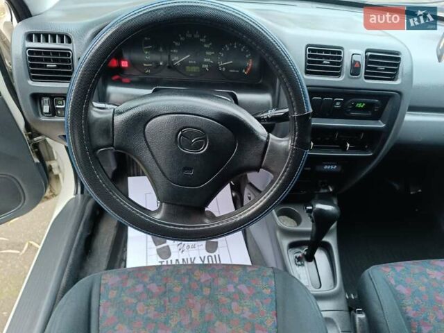 Белый Мазда 323, объемом двигателя 1.5 л и пробегом 420 тыс. км за 2750 $, фото 18 на Automoto.ua
