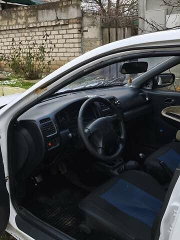 Білий Мазда 323, об'ємом двигуна 1.5 л та пробігом 398 тис. км за 1500 $, фото 9 на Automoto.ua