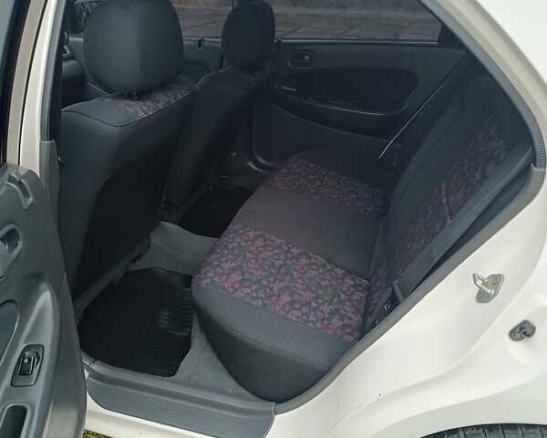 Белый Мазда 323, объемом двигателя 1.5 л и пробегом 420 тыс. км за 2750 $, фото 22 на Automoto.ua