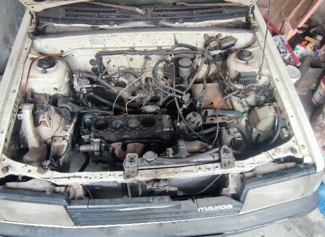 Білий Мазда 323, об'ємом двигуна 1.5 л та пробігом 350 тис. км за 339 $, фото 6 на Automoto.ua