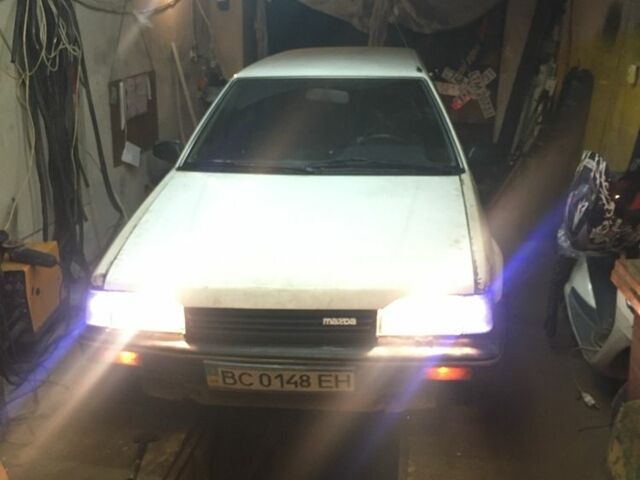 Белый Мазда 323, объемом двигателя 1.7 л и пробегом 300 тыс. км за 1200 $, фото 1 на Automoto.ua