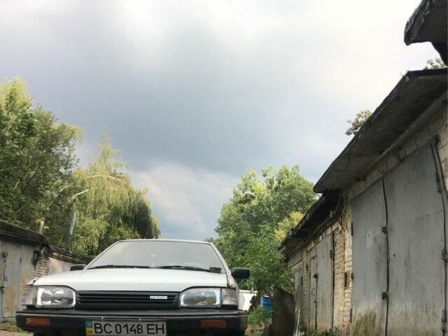 Белый Мазда 323, объемом двигателя 1.7 л и пробегом 300 тыс. км за 1200 $, фото 4 на Automoto.ua