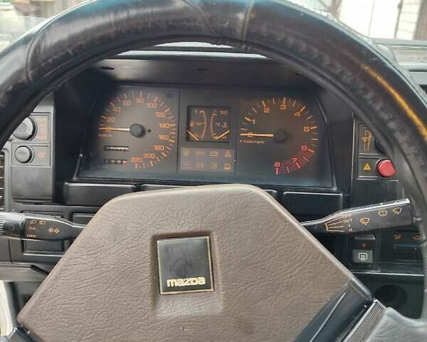 Белый Мазда 323, объемом двигателя 1.5 л и пробегом 177 тыс. км за 1500 $, фото 7 на Automoto.ua