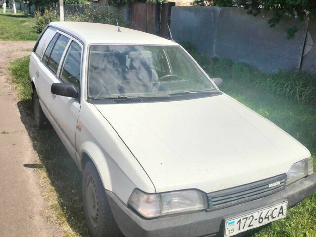 Белый Мазда 323, объемом двигателя 0 л и пробегом 100 тыс. км за 700 $, фото 2 на Automoto.ua