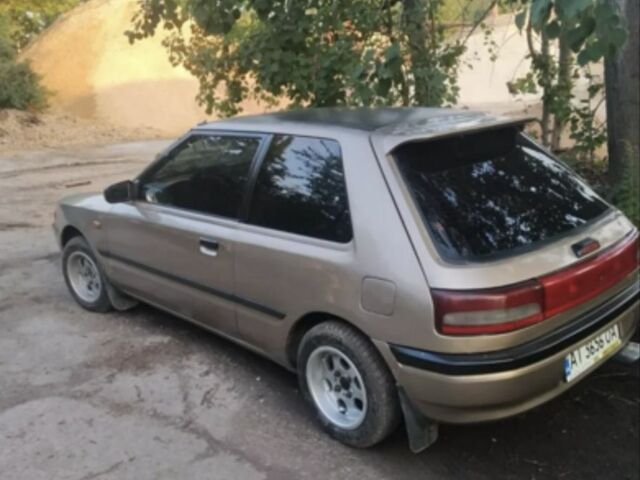 Бежевый Мазда 323, объемом двигателя 1.3 л и пробегом 323 тыс. км за 1500 $, фото 5 на Automoto.ua