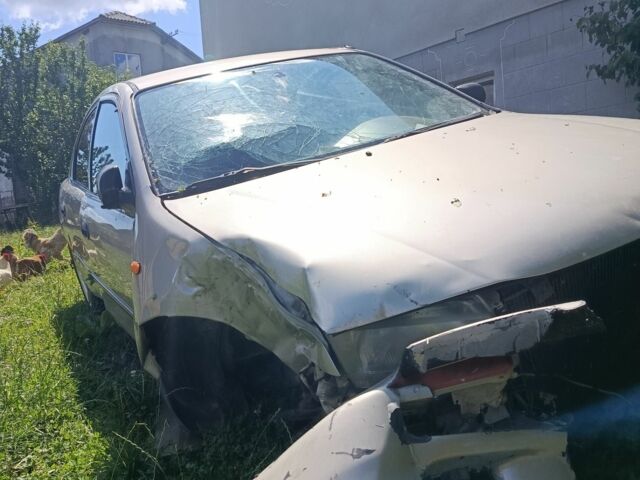 Бежевый Мазда 323, объемом двигателя 1.5 л и пробегом 280 тыс. км за 890 $, фото 4 на Automoto.ua