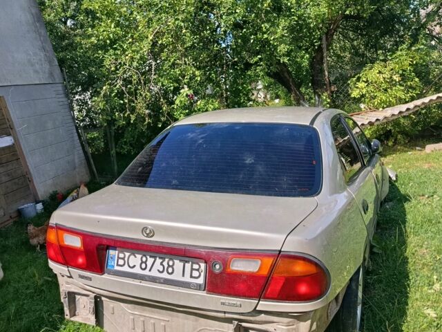 Бежевый Мазда 323, объемом двигателя 1.5 л и пробегом 280 тыс. км за 890 $, фото 1 на Automoto.ua