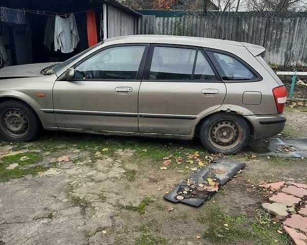 Бежевий Мазда 323, об'ємом двигуна 1.6 л та пробігом 200 тис. км за 1000 $, фото 2 на Automoto.ua