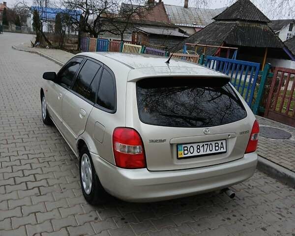 Бежевый Мазда 323, объемом двигателя 2 л и пробегом 210 тыс. км за 2550 $, фото 3 на Automoto.ua