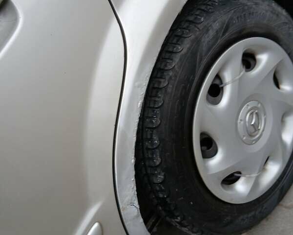 Бежевый Мазда 323, объемом двигателя 2 л и пробегом 210 тыс. км за 2550 $, фото 5 на Automoto.ua