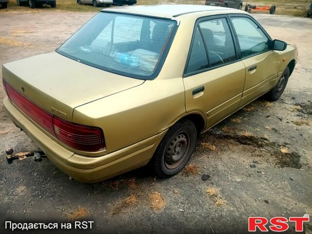 Бежевий Мазда 323, об'ємом двигуна 1.5 л та пробігом 500 тис. км за 740 $, фото 1 на Automoto.ua