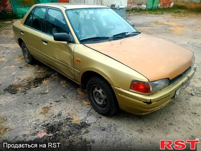 Бежевий Мазда 323, об'ємом двигуна 1.5 л та пробігом 500 тис. км за 740 $, фото 3 на Automoto.ua