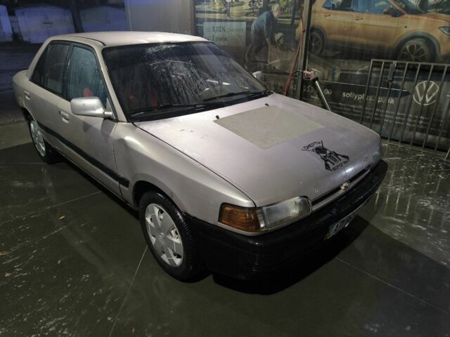 Бежевый Мазда 323, объемом двигателя 1.6 л и пробегом 300 тыс. км за 715 $, фото 1 на Automoto.ua