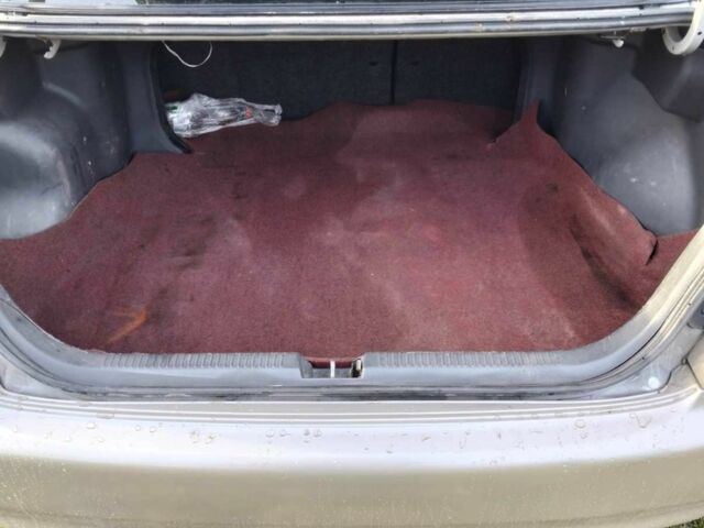 Бежевый Мазда 323, объемом двигателя 1.5 л и пробегом 234 тыс. км за 1500 $, фото 4 на Automoto.ua