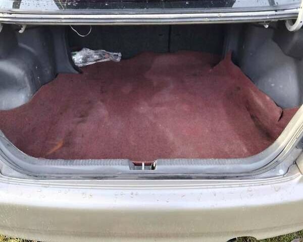 Бежевый Мазда 323, объемом двигателя 1.49 л и пробегом 250 тыс. км за 1350 $, фото 4 на Automoto.ua