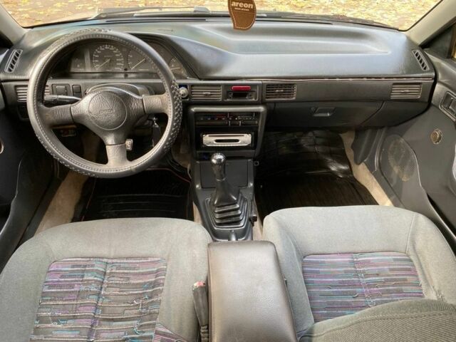 Бежевий Мазда 323, об'ємом двигуна 1.6 л та пробігом 400 тис. км за 899 $, фото 12 на Automoto.ua