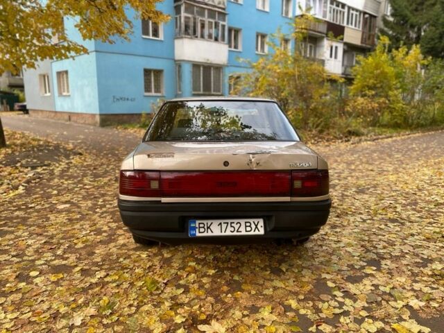 Бежевий Мазда 323, об'ємом двигуна 1.6 л та пробігом 400 тис. км за 899 $, фото 4 на Automoto.ua