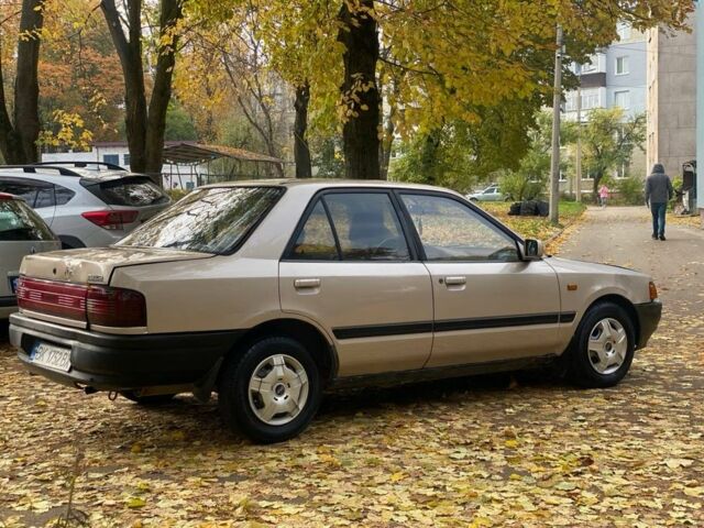 Бежевий Мазда 323, об'ємом двигуна 1.6 л та пробігом 400 тис. км за 899 $, фото 6 на Automoto.ua