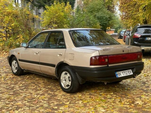 Бежевий Мазда 323, об'ємом двигуна 1.6 л та пробігом 400 тис. км за 899 $, фото 3 на Automoto.ua