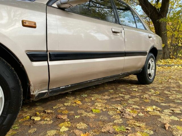 Бежевий Мазда 323, об'ємом двигуна 1.6 л та пробігом 400 тис. км за 899 $, фото 10 на Automoto.ua